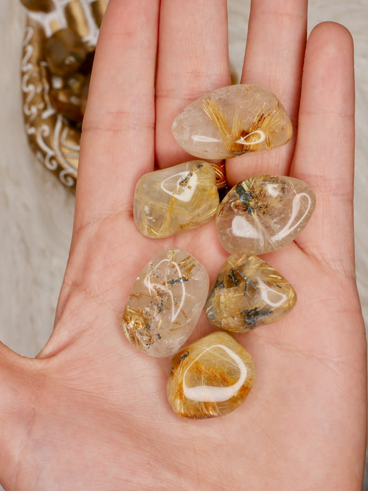 Rutile in Quartz tumbled stones small